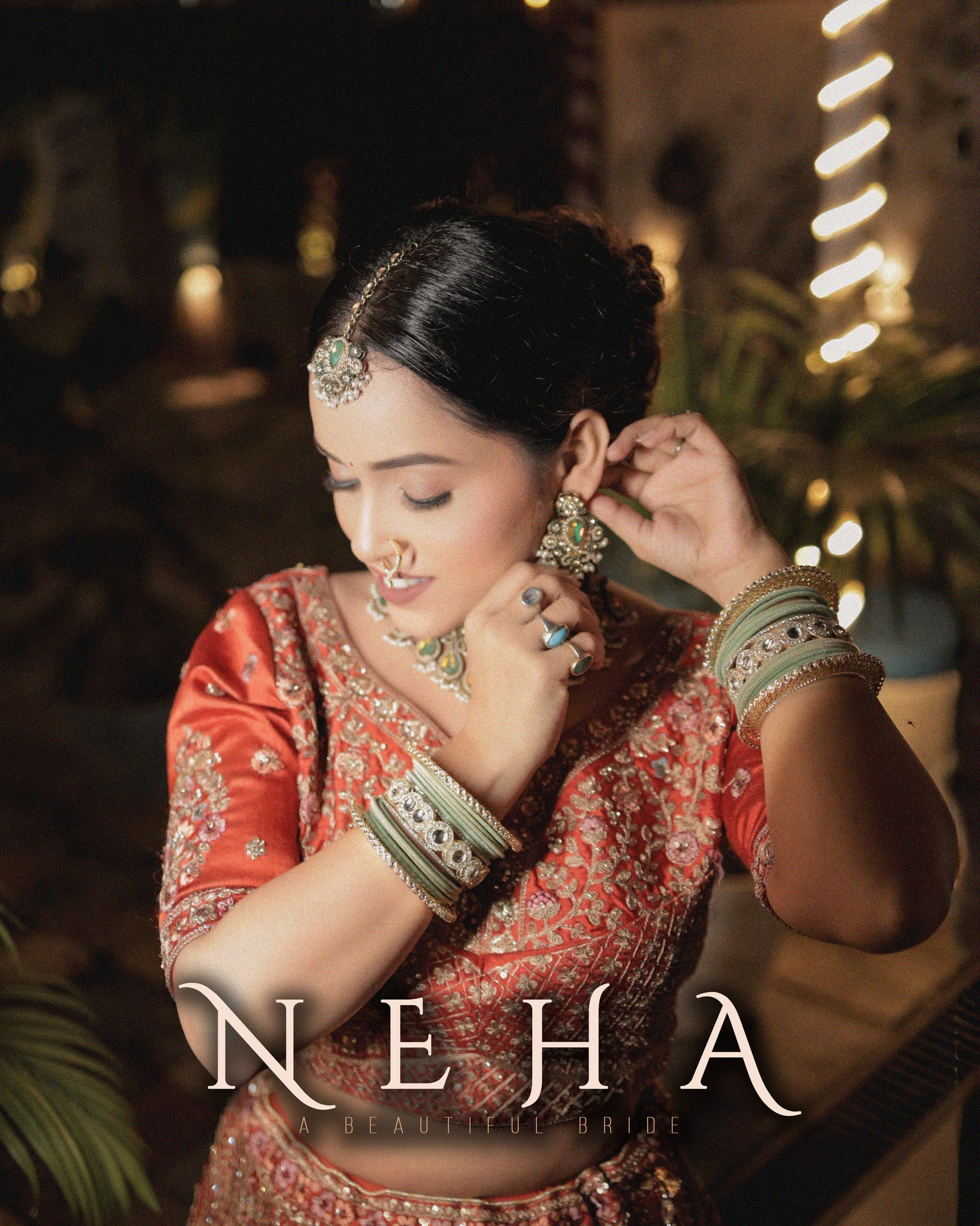 The bride fastening an earring, warm light behind her